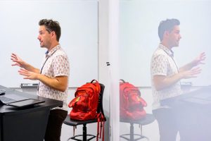 Photo of Michael Curtin teaching his Game Studies course.